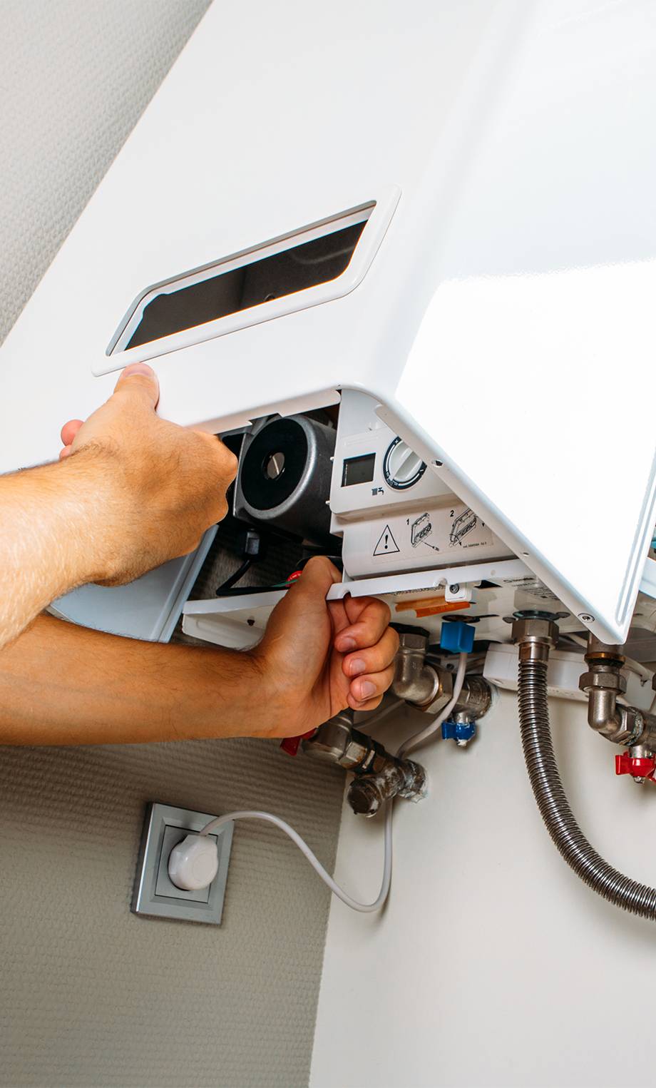 plumber-attaches-trying-fix-problem-with-residential-heating-equipment-repair-gas-boiler